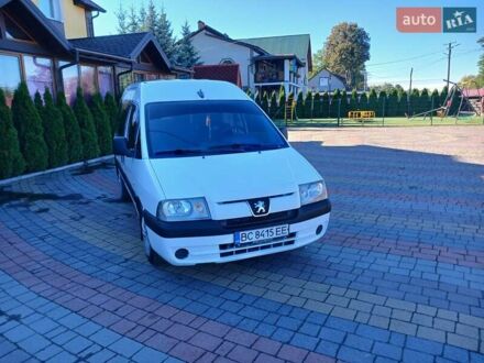 Белый Пежо Эксперт груз.-пасс., объемом двигателя 2 л и пробегом 500 тыс. км за 2900 $, фото 1 на Automoto.ua
