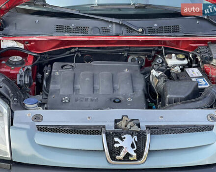 Красный Пежо Партнер груз.-пасс., объемом двигателя 2 л и пробегом 284 тыс. км за 3150 $, фото 53 на Automoto.ua