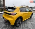 Желтый Пежо e-208, объемом двигателя 0 л и пробегом 129 тыс. км за 14399 $, фото 9 на Automoto.ua