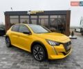 Желтый Пежо e-208, объемом двигателя 0 л и пробегом 129 тыс. км за 14399 $, фото 1 на Automoto.ua