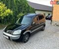 Черный Пежо Partner, объемом двигателя 2 л и пробегом 305 тыс. км за 3650 $, фото 1 на Automoto.ua