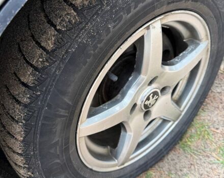 Серый Пежо Partner, объемом двигателя 2 л и пробегом 225 тыс. км за 3450 $, фото 12 на Automoto.ua