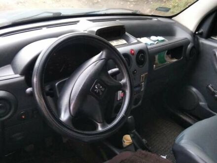 Синий Пежо Partner, объемом двигателя 1.9 л и пробегом 300 тыс. км за 3900 $, фото 1 на Automoto.ua