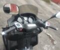 Черный Пиаджо MP3, объемом двигателя 0.25 л и пробегом 17 тыс. км за 2500 $, фото 1 на Automoto.ua