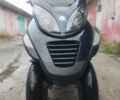 Черный Пиаджо MP3, объемом двигателя 0.25 л и пробегом 17 тыс. км за 2500 $, фото 5 на Automoto.ua