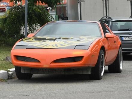 Оранжевый Понтиак Файрберд, объемом двигателя 0.57 л и пробегом 210 тыс. км за 7500 $, фото 1 на Automoto.ua