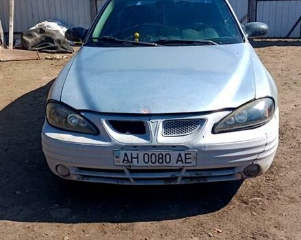 Сірий Понтіак Гранд АМ, об'ємом двигуна 2.2 л та пробігом 220 тис. км за 1500 $, фото 1 на Automoto.ua