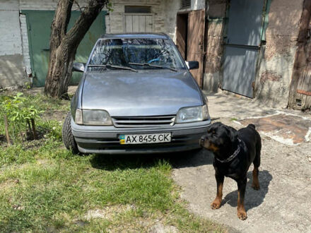 Сірий Понтіак Лєманс, об'ємом двигуна 1.6 л та пробігом 222 тис. км за 1100 $, фото 1 на Automoto.ua