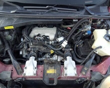 Червоний Понтіак Montana, об'ємом двигуна 0 л та пробігом 200 тис. км за 2500 $, фото 1 на Automoto.ua