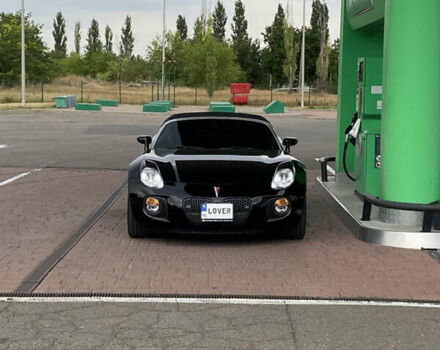 Черный Понтиак Солстис, объемом двигателя 2 л и пробегом 90 тыс. км за 18500 $, фото 1 на Automoto.ua