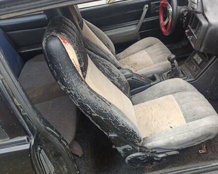 Черный Понтиак Санберд, объемом двигателя 2 л и пробегом 120 тыс. км за 450 $, фото 1 на Automoto.ua