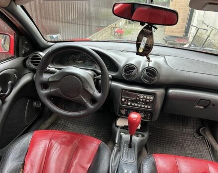 Красный Понтиак Санфаер, объемом двигателя 2.2 л и пробегом 200 тыс. км за 2800 $, фото 2 на Automoto.ua