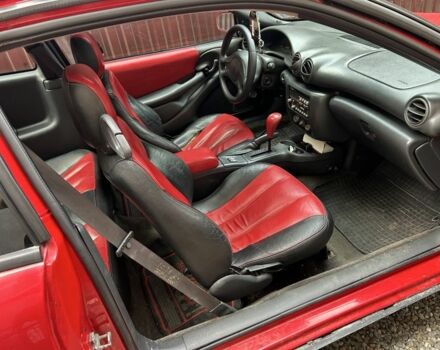 Красный Понтиак Санфаер, объемом двигателя 2.2 л и пробегом 200 тыс. км за 2800 $, фото 1 на Automoto.ua