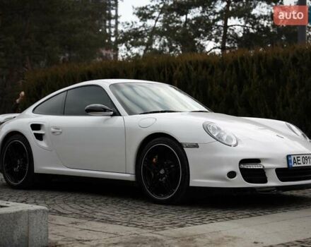 Белый Порше 911, объемом двигателя 3.6 л и пробегом 64 тыс. км за 76000 $, фото 1 на Automoto.ua