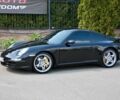 Черный Порше 911, объемом двигателя 3.8 л и пробегом 67 тыс. км за 29999 $, фото 1 на Automoto.ua