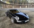 Черный Порше 911, объемом двигателя 3.8 л и пробегом 63 тыс. км за 38500 $, фото 1 на Automoto.ua