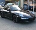 Черный Порше 911, объемом двигателя 3.8 л и пробегом 61 тыс. км за 29900 $, фото 1 на Automoto.ua