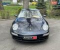 Черный Порше 911, объемом двигателя 3.8 л и пробегом 39 тыс. км за 59990 $, фото 1 на Automoto.ua