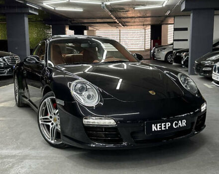 Черный Порше 911, объемом двигателя 3.8 л и пробегом 49 тыс. км за 75000 $, фото 4 на Automoto.ua