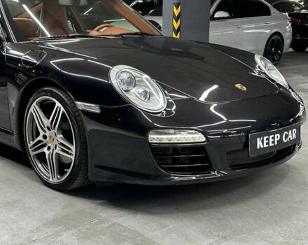 Черный Порше 911, объемом двигателя 3.8 л и пробегом 49 тыс. км за 75000 $, фото 9 на Automoto.ua