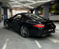 Черный Порше 911, объемом двигателя 3.8 л и пробегом 49 тыс. км за 75000 $, фото 12 на Automoto.ua