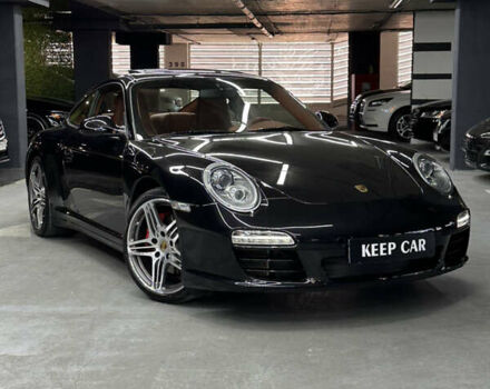 Черный Порше 911, объемом двигателя 3.8 л и пробегом 49 тыс. км за 75000 $, фото 3 на Automoto.ua