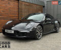 Черный Порше 911, объемом двигателя 3.8 л и пробегом 86 тыс. км за 80000 $, фото 1 на Automoto.ua