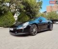 Черный Порше 911, объемом двигателя 3.8 л и пробегом 53 тыс. км за 125000 $, фото 1 на Automoto.ua