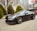Черный Порше 911, объемом двигателя 3.8 л и пробегом 53 тыс. км за 125000 $, фото 1 на Automoto.ua