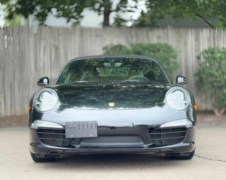 Черный Порше 911, объемом двигателя 3.8 л и пробегом 79 тыс. км за 42900 $, фото 1 на Automoto.ua