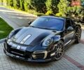 Черный Порше 911, объемом двигателя 3.8 л и пробегом 18 тыс. км за 160000 $, фото 1 на Automoto.ua