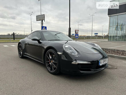 Черный Порше 911, объемом двигателя 3.8 л и пробегом 48 тыс. км за 85000 $, фото 1 на Automoto.ua