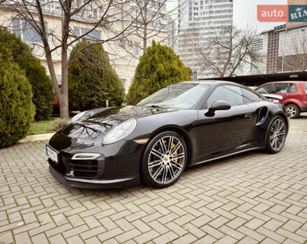 Черный Порше 911, объемом двигателя 3.8 л и пробегом 53 тыс. км за 125000 $, фото 1 на Automoto.ua