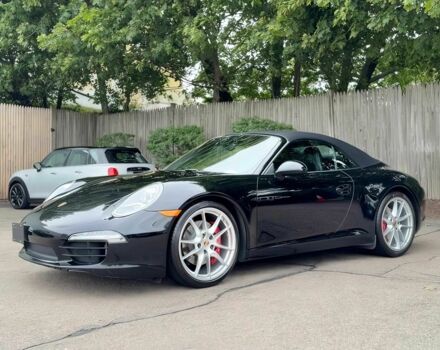 Черный Порше 911, объемом двигателя 3.8 л и пробегом 79 тыс. км за 42900 $, фото 1 на Automoto.ua