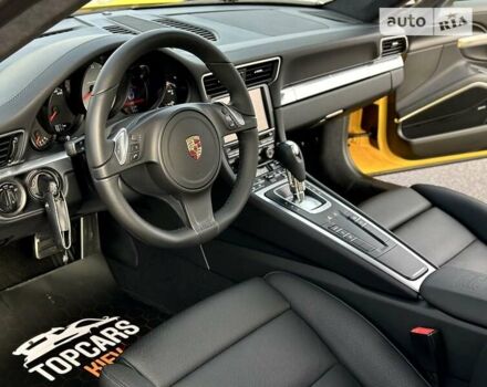 Желтый Порше 911, объемом двигателя 3.8 л и пробегом 3 тыс. км за 111000 $, фото 29 на Automoto.ua
