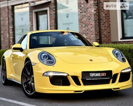Желтый Порше 911, объемом двигателя 3.8 л и пробегом 3 тыс. км за 111000 $, фото 51 на Automoto.ua