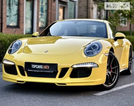 Жовтий Порше 911, об'ємом двигуна 3.8 л та пробігом 3 тис. км за 111000 $, фото 1 на Automoto.ua
