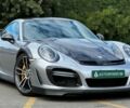 Серый Порше 911, объемом двигателя 3.8 л и пробегом 62 тыс. км за 178000 $, фото 1 на Automoto.ua