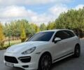 Белый Порше Каен, объемом двигателя 4.81 л и пробегом 208 тыс. км за 16000 $, фото 1 на Automoto.ua