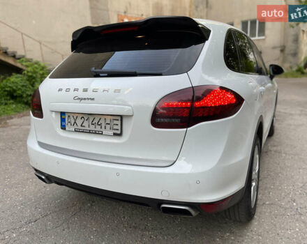 Белый Порше Каен, объемом двигателя 3 л и пробегом 190 тыс. км за 23000 $, фото 1 на Automoto.ua