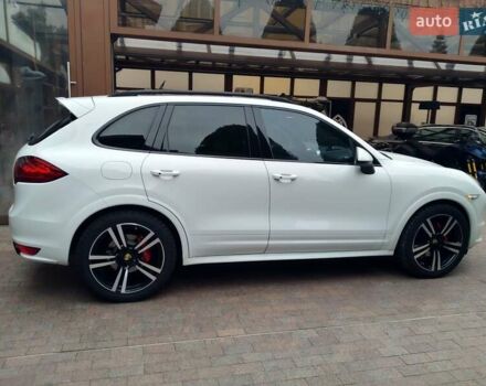 Белый Порше Каен, объемом двигателя 4.81 л и пробегом 62 тыс. км за 34500 $, фото 2 на Automoto.ua