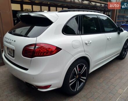 Белый Порше Каен, объемом двигателя 4.81 л и пробегом 62 тыс. км за 34500 $, фото 5 на Automoto.ua