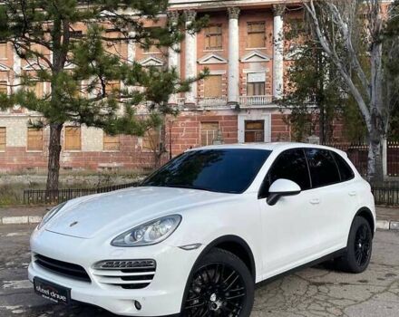 Белый Порше Каен, объемом двигателя 3 л и пробегом 150 тыс. км за 21999 $, фото 1 на Automoto.ua