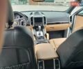 Белый Порше Каен, объемом двигателя 3.6 л и пробегом 150 тыс. км за 28500 $, фото 6 на Automoto.ua