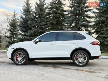 Белый Порше Каен, объемом двигателя 4.81 л и пробегом 133 тыс. км за 22000 $, фото 1 на Automoto.ua