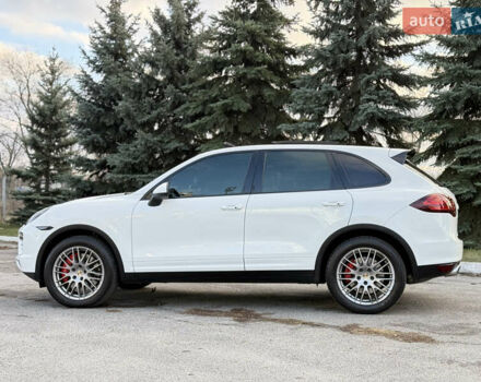 Белый Порше Каен, объемом двигателя 4.81 л и пробегом 133 тыс. км за 22000 $, фото 1 на Automoto.ua