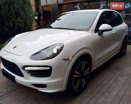 Белый Порше Каен, объемом двигателя 4.81 л и пробегом 62 тыс. км за 34500 $, фото 1 на Automoto.ua