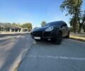 Черный Порше Каен, объемом двигателя 4.5 л и пробегом 240 тыс. км за 5600 $, фото 1 на Automoto.ua