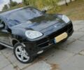 Черный Порше Каен, объемом двигателя 4.5 л и пробегом 210 тыс. км за 6355 $, фото 1 на Automoto.ua