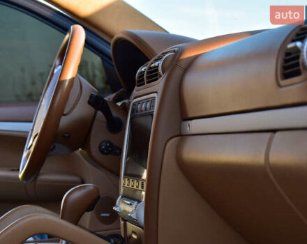 Черный Порше Каен, объемом двигателя 4.5 л и пробегом 111 тыс. км за 8500 $, фото 16 на Automoto.ua